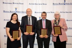Emily Grossman, Bob Myers, Irfan Hasan, and Ann Hardiman with their awards
